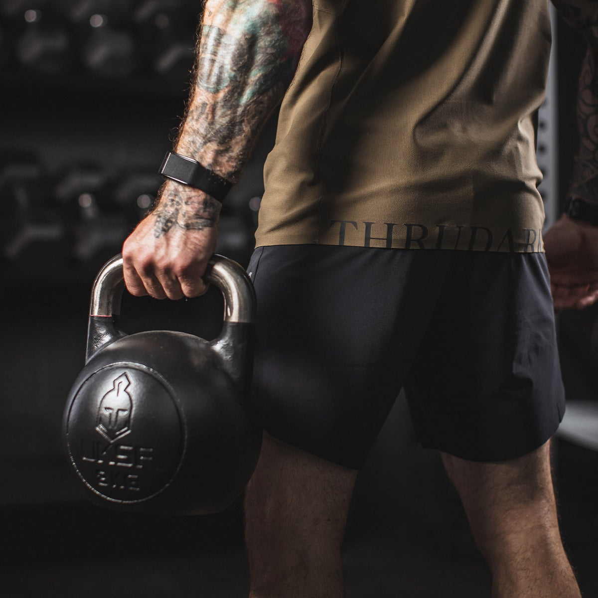 An in the field image of Men's Force Velocity 2-In-1 Short G2 in Obsidian Black (ITF)