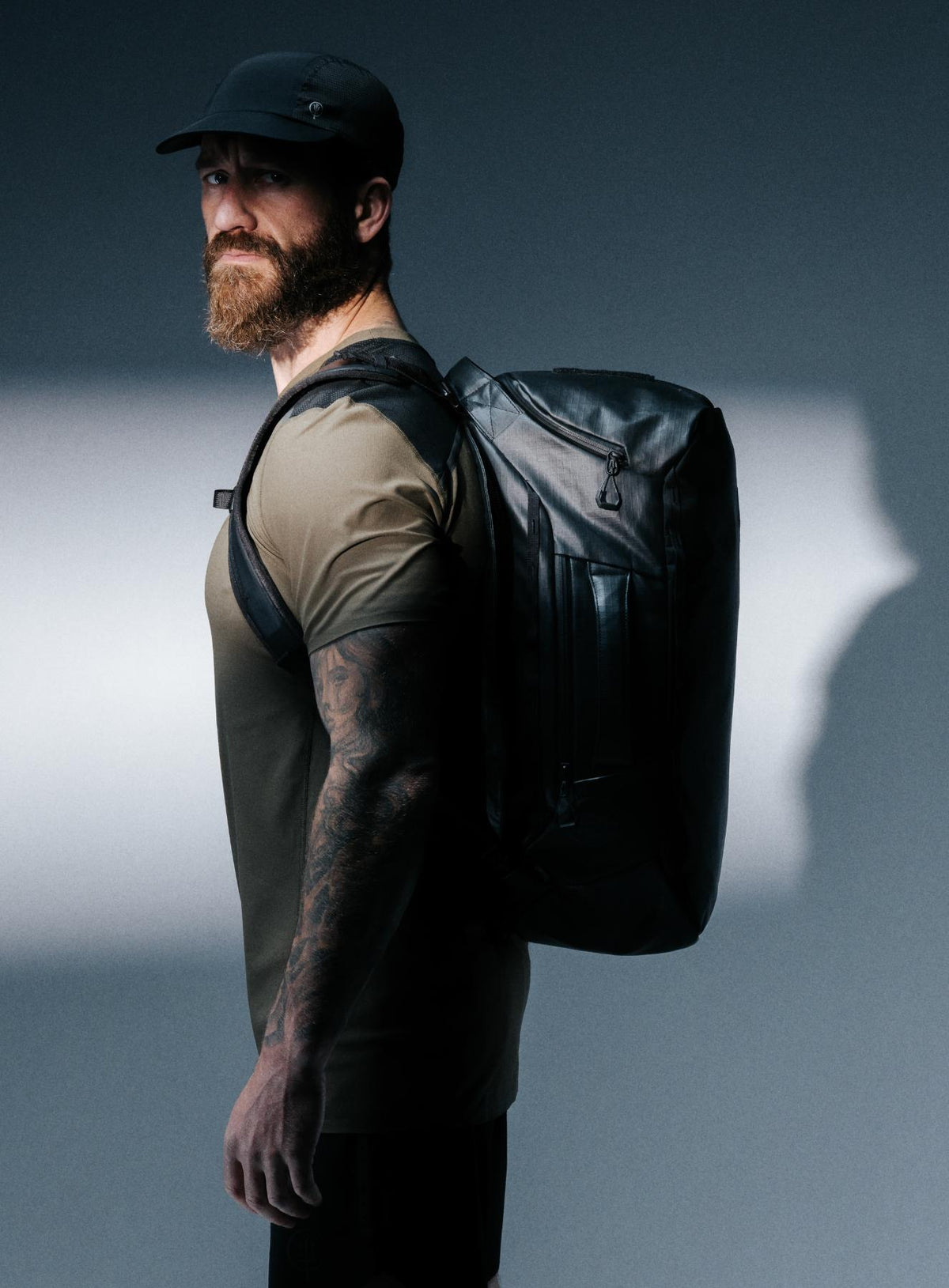 A creative studio shot of Citadel 45L Duffel Bag in Obsidian Black (CS)