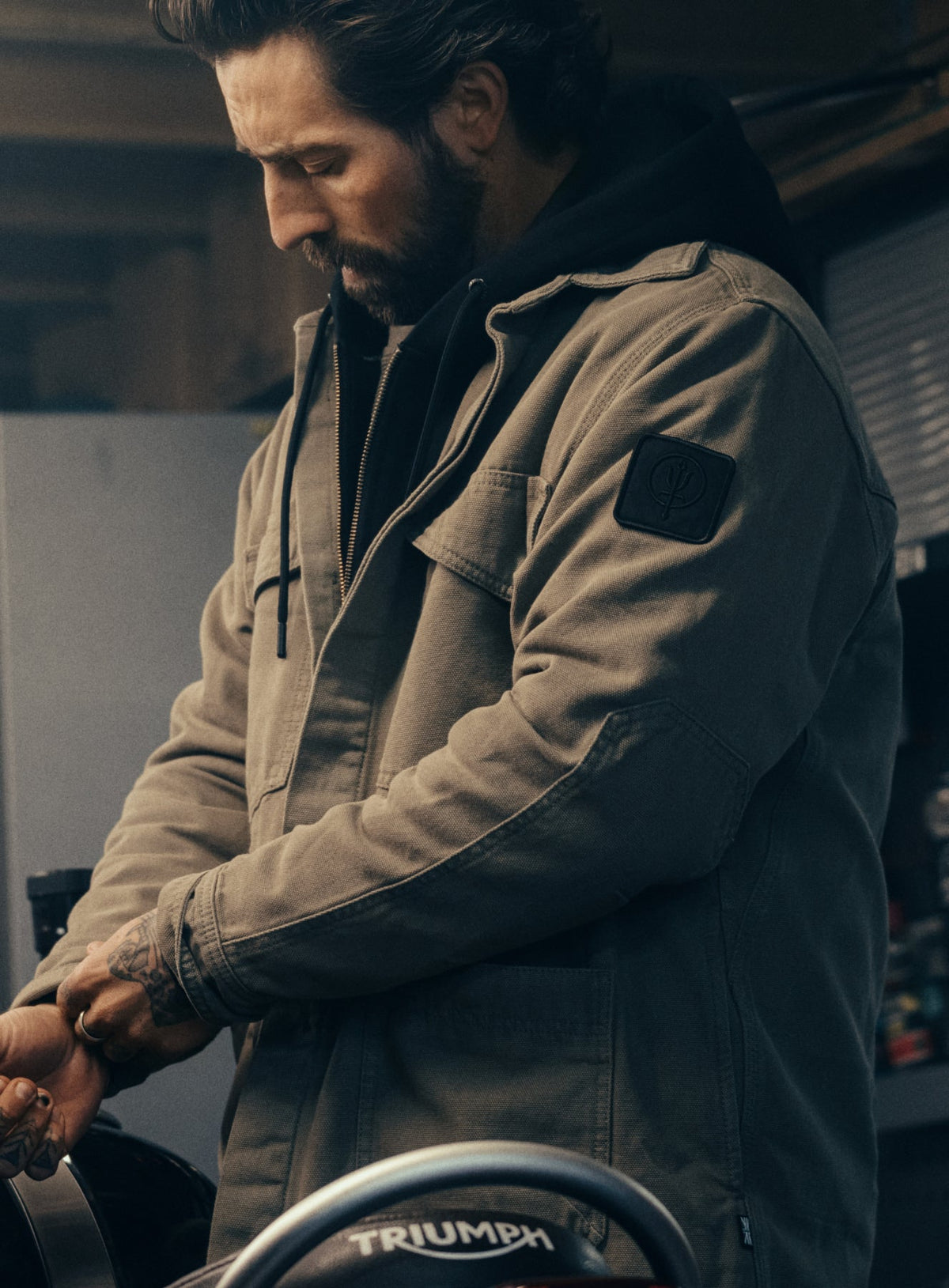 An in the field image of Men's Dissident Canvas Jacket in Khaki (ITF)