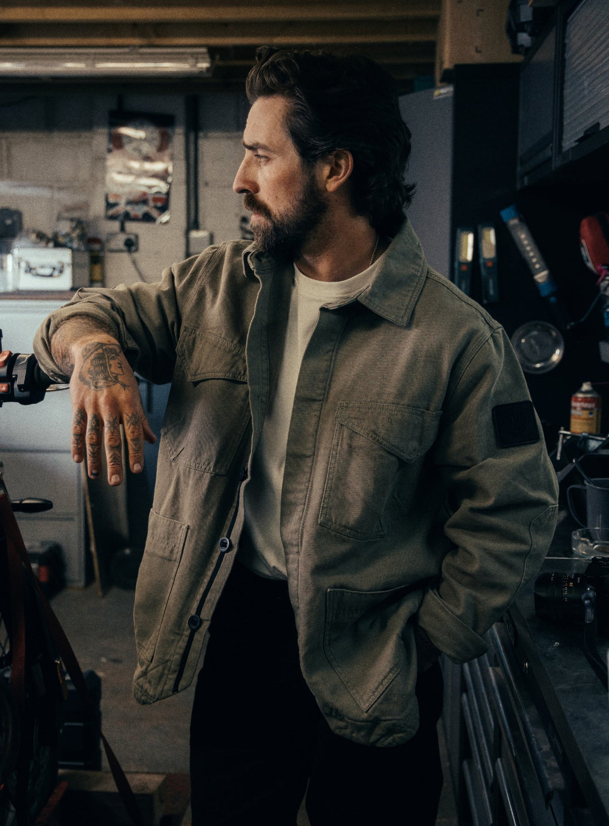 An in the field image of Men's Dissident Canvas Jacket in Khaki (ITF)