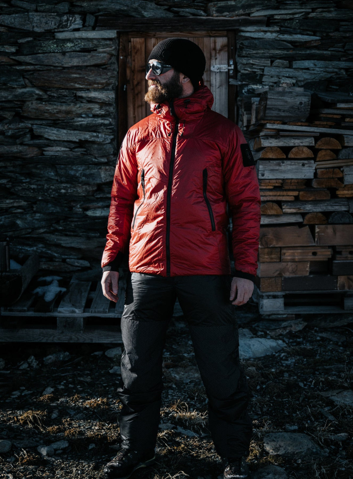 An in the field image of Men's Engage Jacket in Crimson Red (ITF)