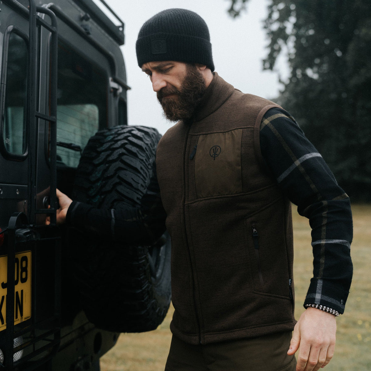 An in the field image of Men's HeriTech Moorland Fleece Gilet in Woodland Brown (ITF)