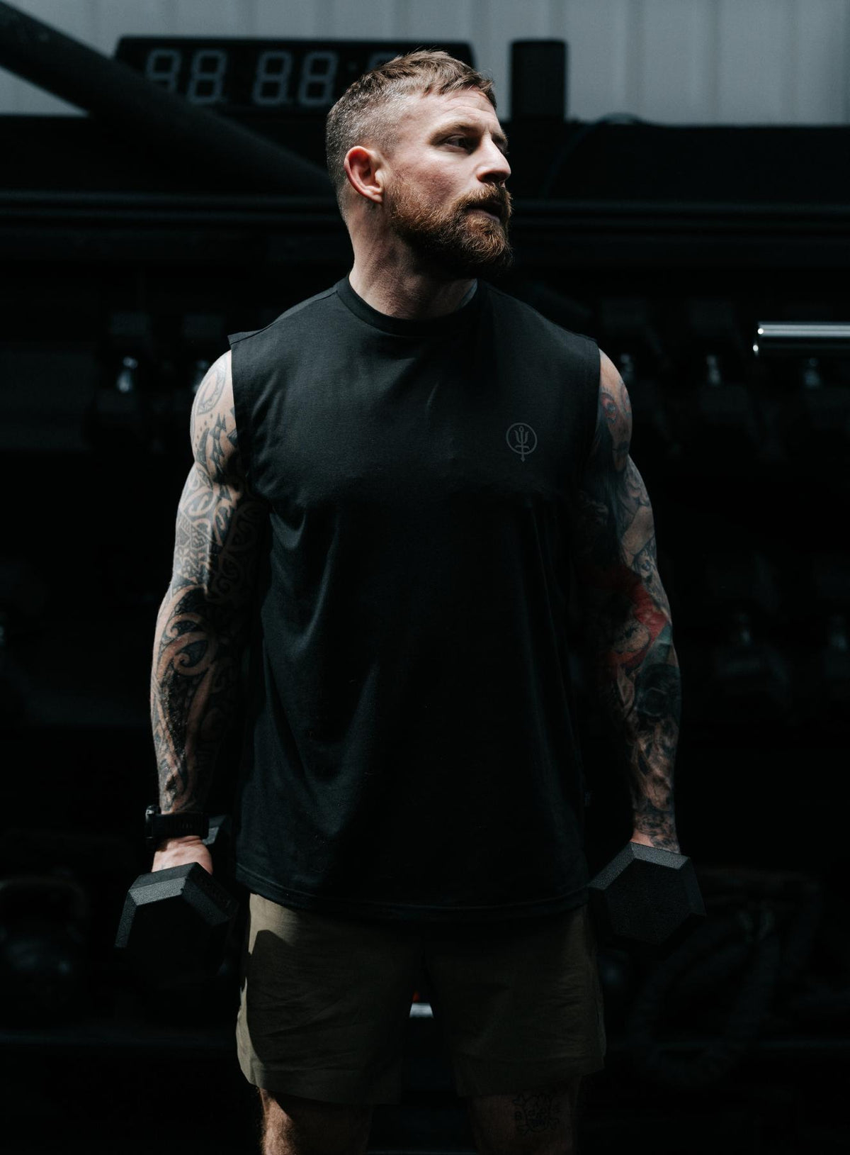 An in the field image of Men's Force DriRelease Tank in Black (ITF)