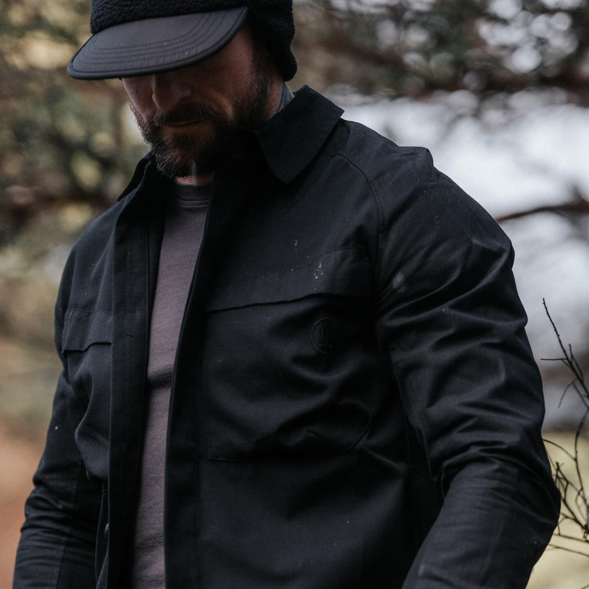 An in the field image of Men's HeriTech Sylvan Shirt in Obsidian Black (ITF)