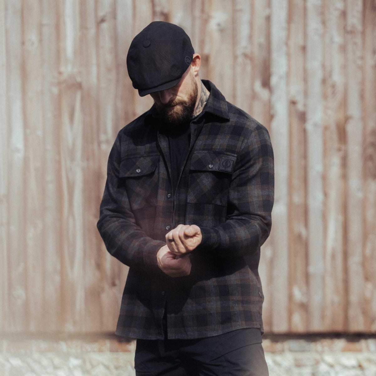 An in the field image of Men's HeriTech Badlands Flannel Shirt in Obsidian Black (ITF)