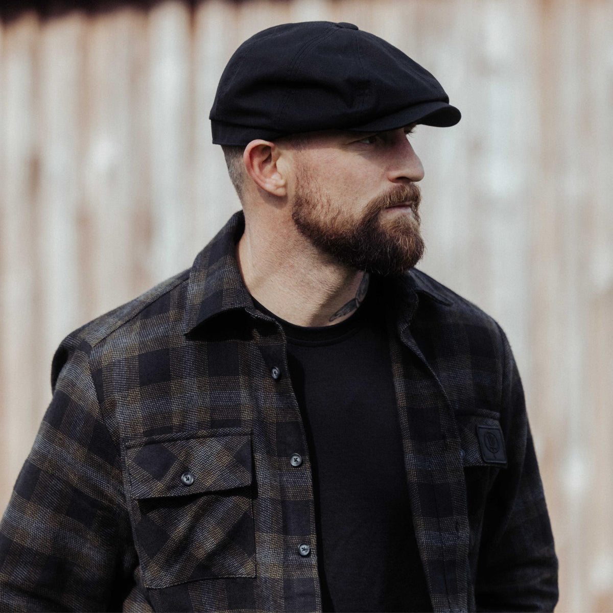An in the field image of Men's HeriTech Badlands Flannel Shirt in Obsidian Black (ITF)
