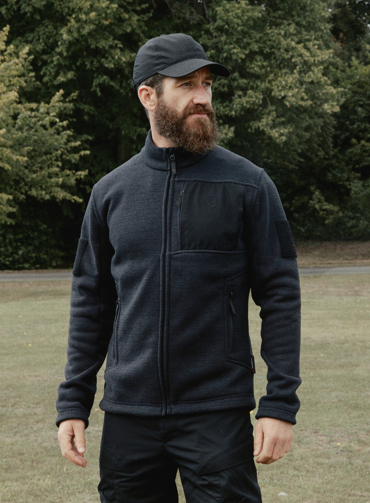 An in the field image of Men's HeriTech Moorland Fleece in Obsidian Black (ITF)