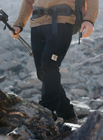 An in the field image of Men's Mountain Pro Technical Trousers in Obsidian Black (ITF)