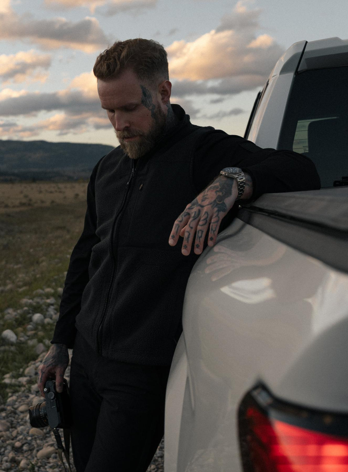 Max Is 5ft 8" And Wears Size: M | Hem Studio Image Of Model Wearing Mantra Gilet In Obsidian Black (SS Model)