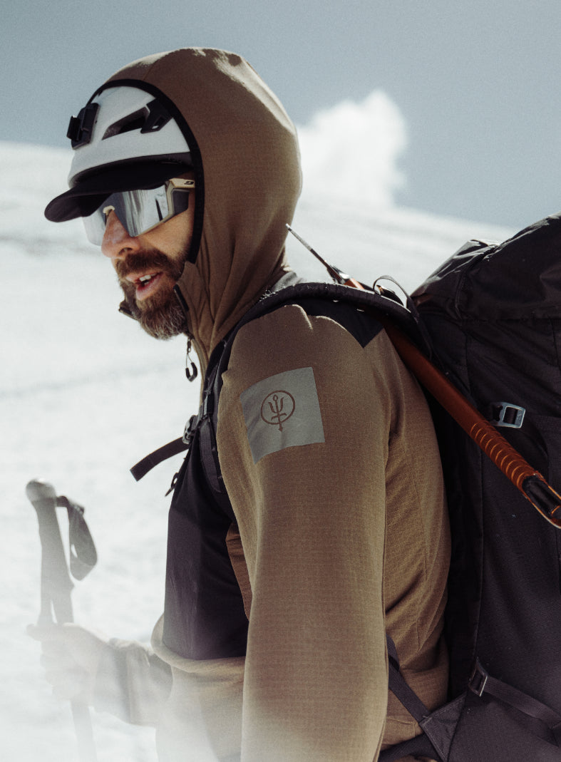 An in the field image of Men's Mountain Pro Technical Mid Layer in Coyote Brown (ITF)