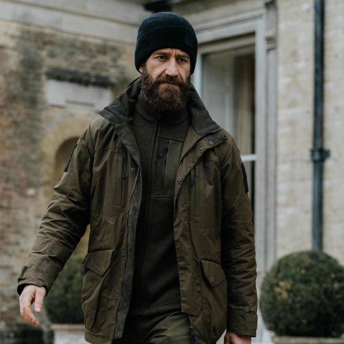 An in the field image of Men's HeriTech Grange Jacket in Khaki (ITF)