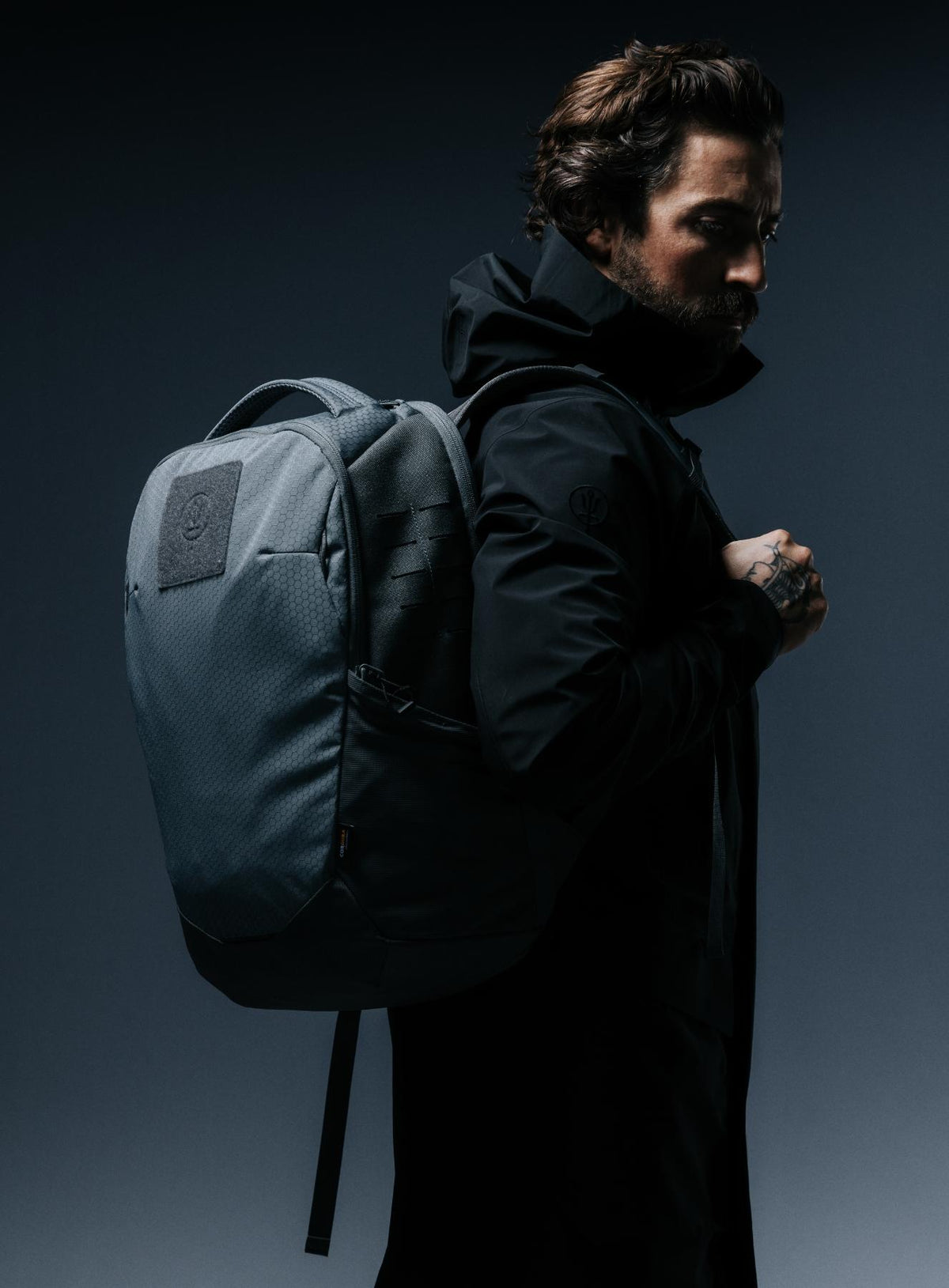 A creative studio shot of Phantom 25L Backpack in Antimony Grey (CS)