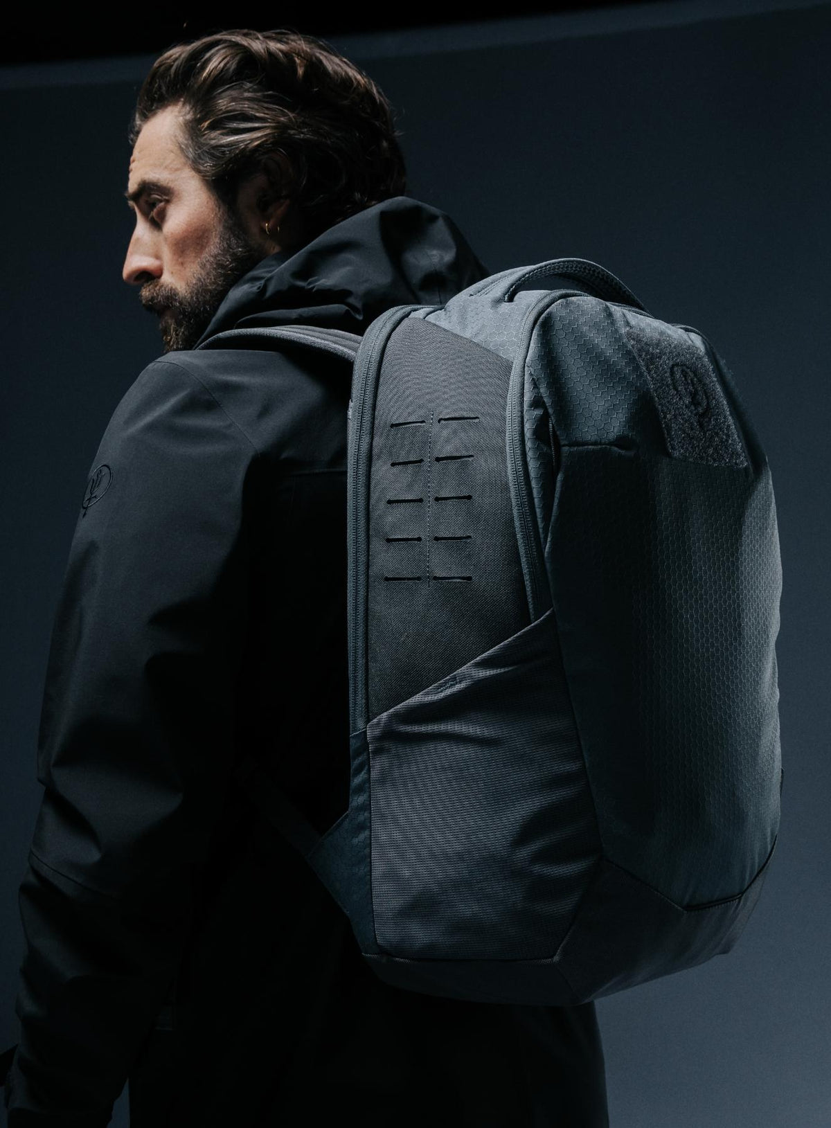 A creative studio shot of Phantom 25L Backpack in Antimony Grey (CS)