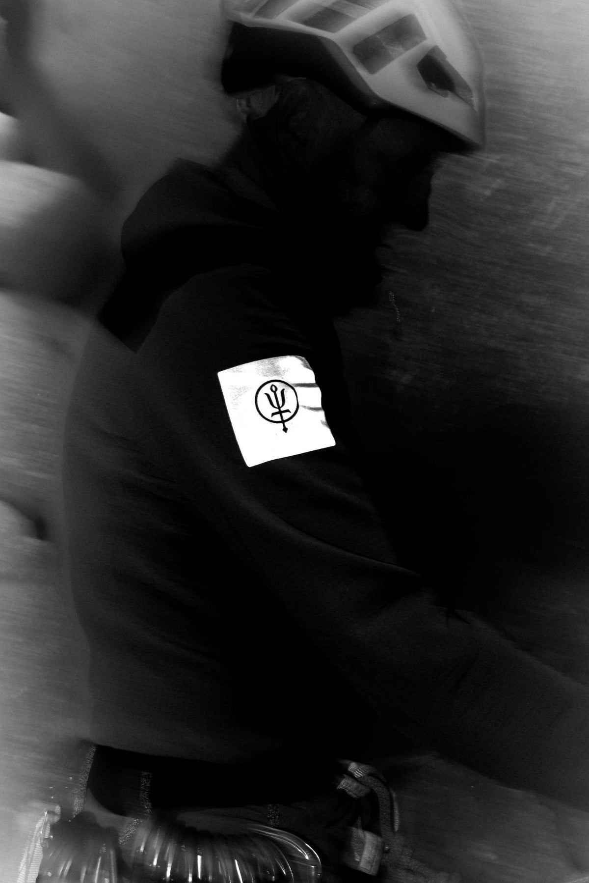 A creative studio shot of Men's Mountain Pro Technical Mid Layer in Obsidian Black (CS)