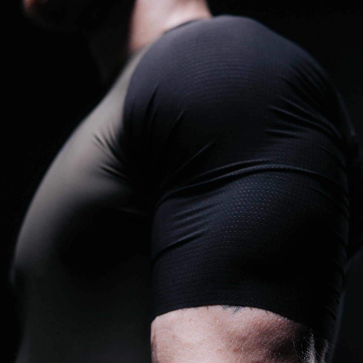 A creative studio shot of Men's Force Cadence Road Bike Jersey in Khaki (CS)