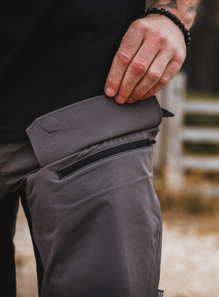 An in the field image of Men's Strike Shorts in Wolf Grey (ITF)
