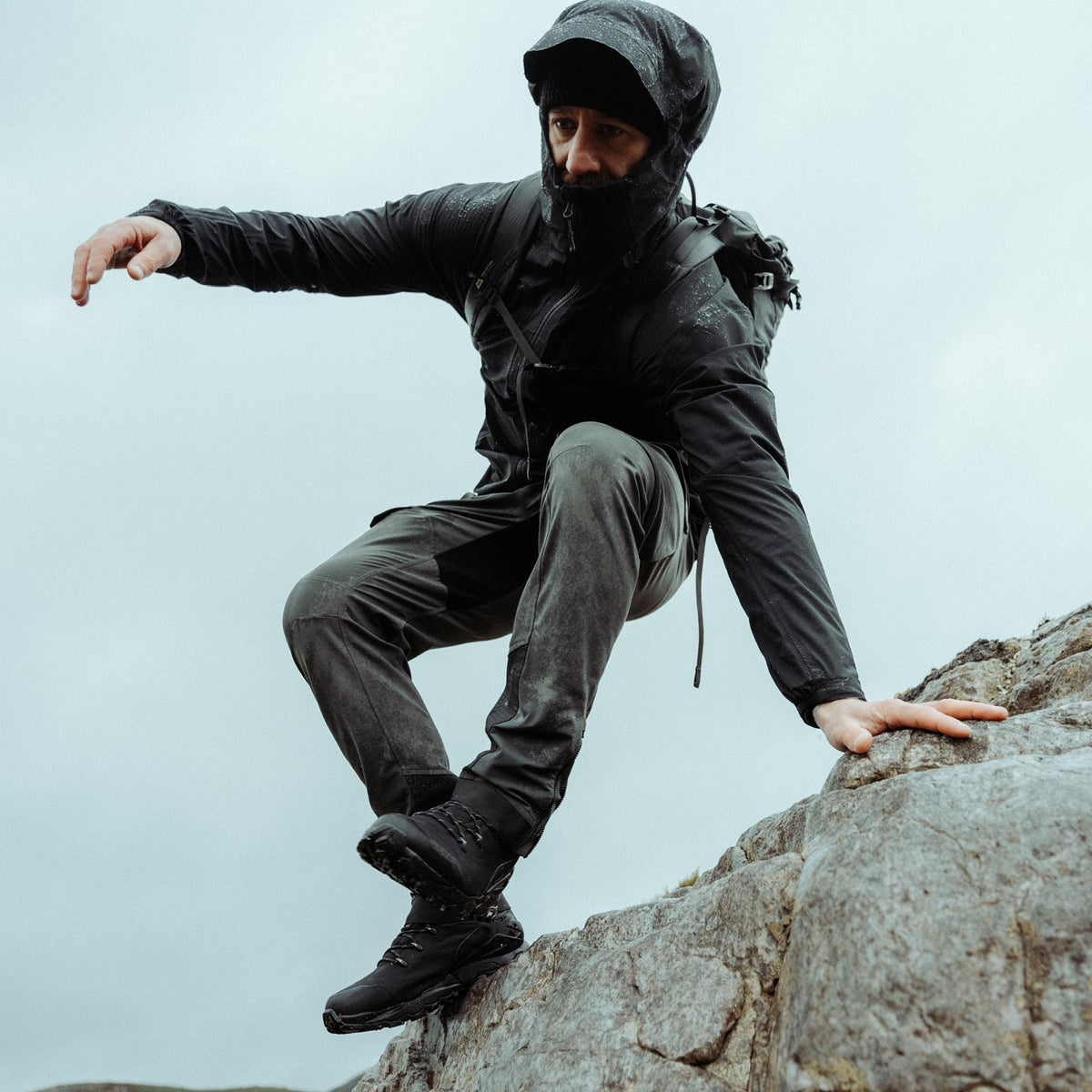 An in the field image of Men's Vanguard Jacket in Obsidian Black (ITF)