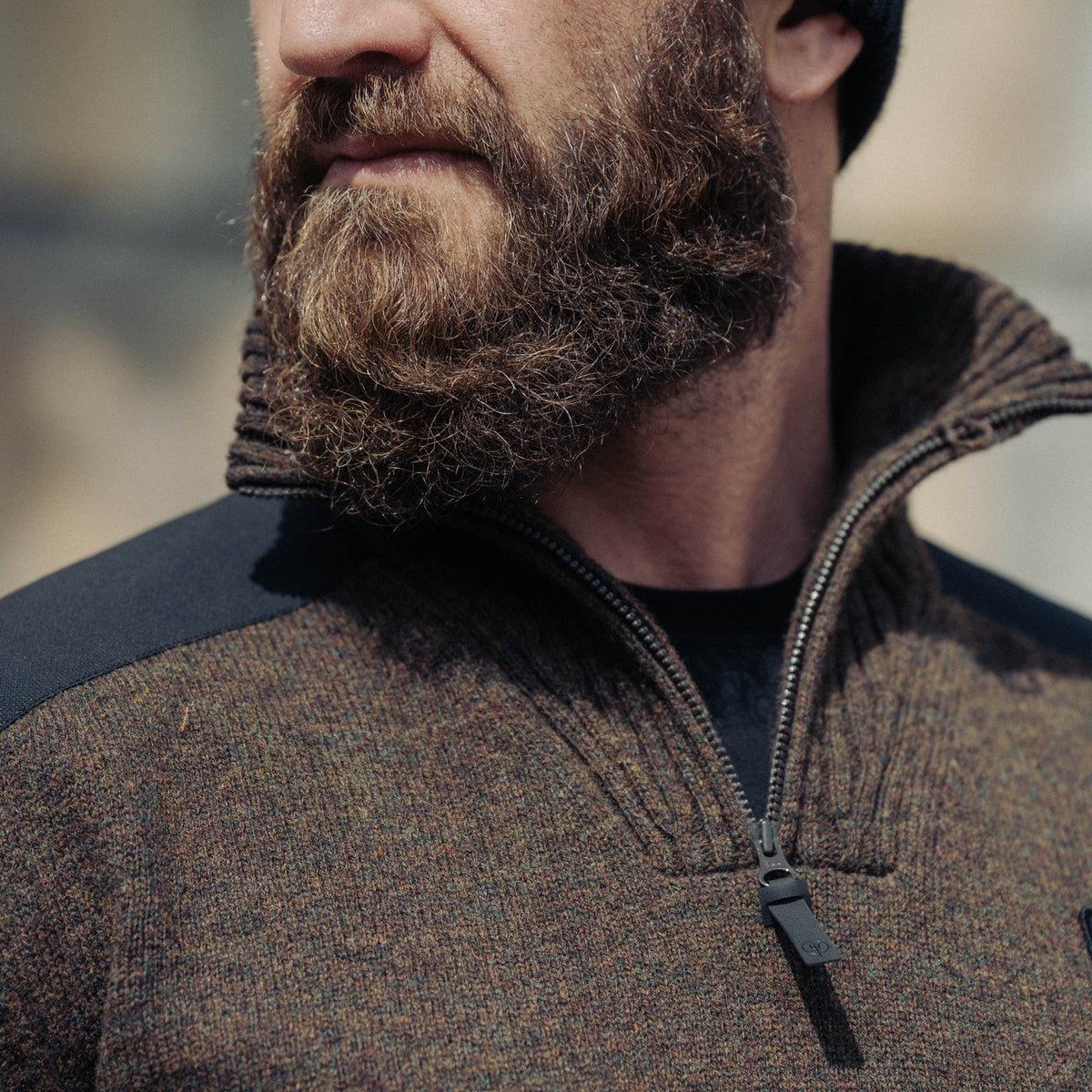 An in the field image of Men's HeriTech Funnel Neck Jumper in Brown (ITF)