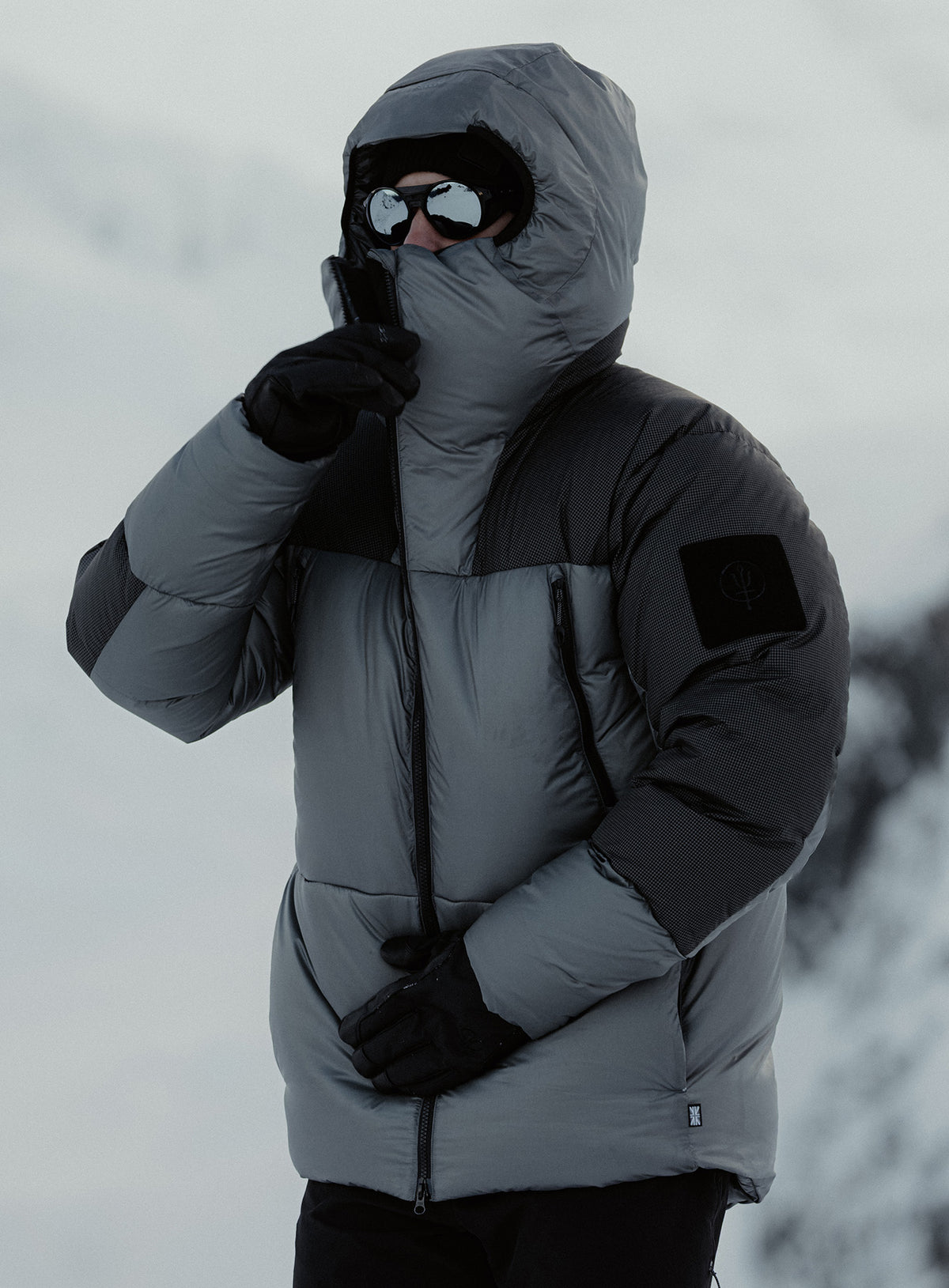 An in the field image of Breach Jacket in Antimony Grey (ITF)