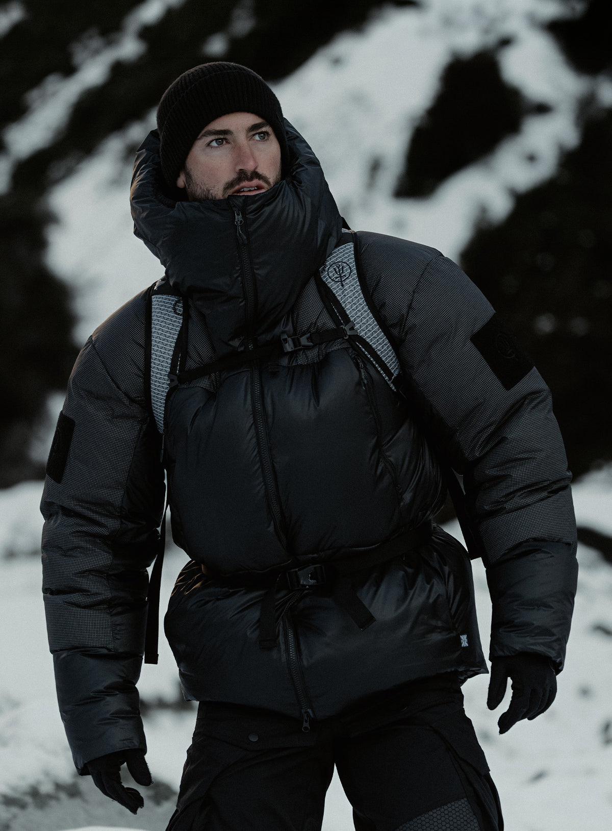 An in the field image of Breach Jacket in Obsidian Black (ITF)