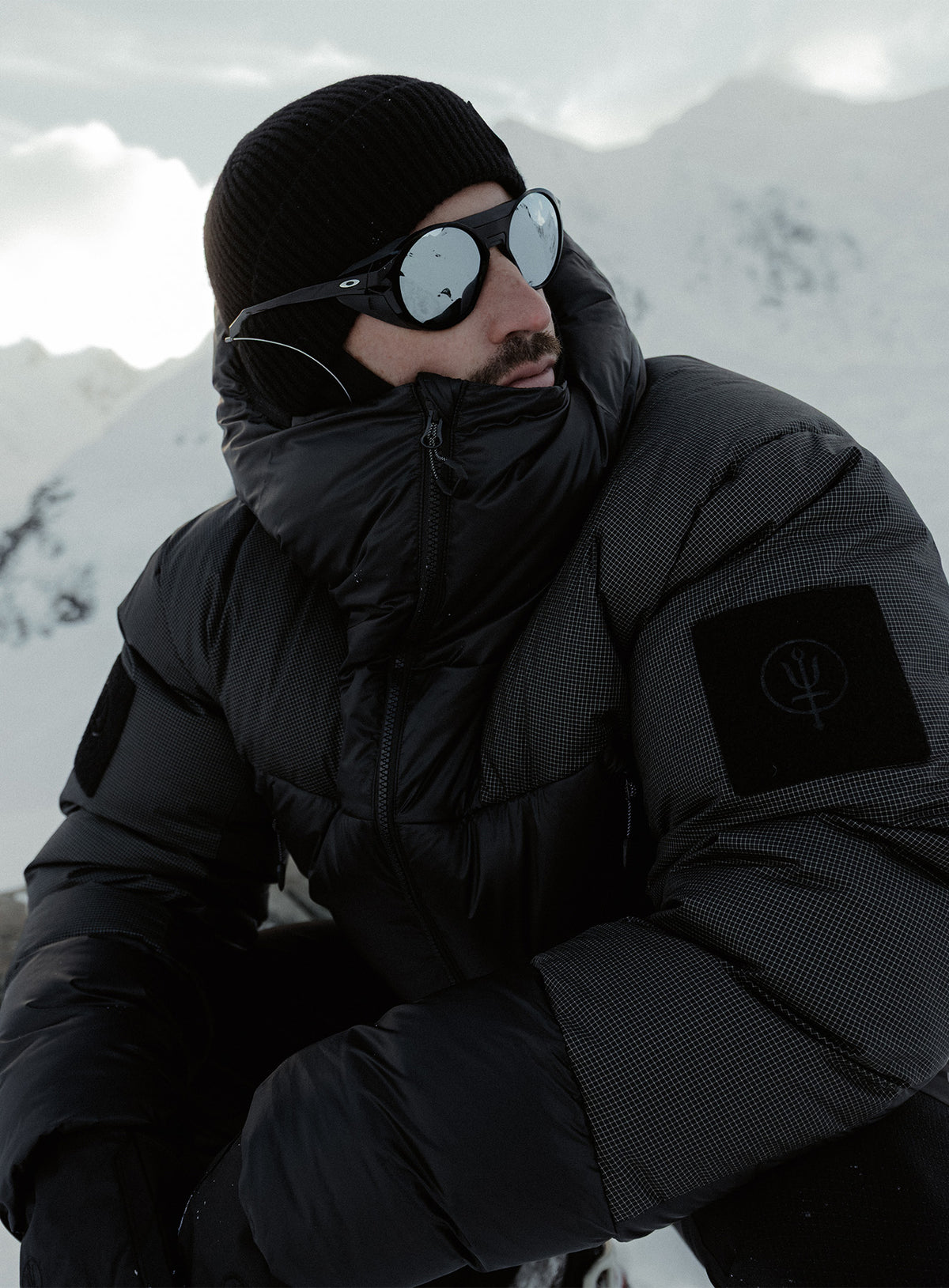 An in the field image of Breach Jacket in Obsidian Black (ITF)