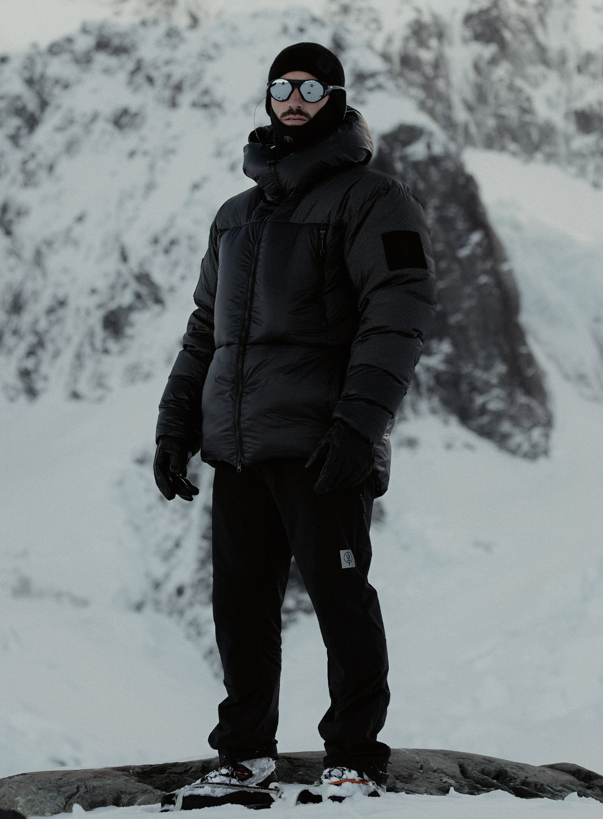 An in the field image of Breach Jacket in Obsidian Black (ITF)
