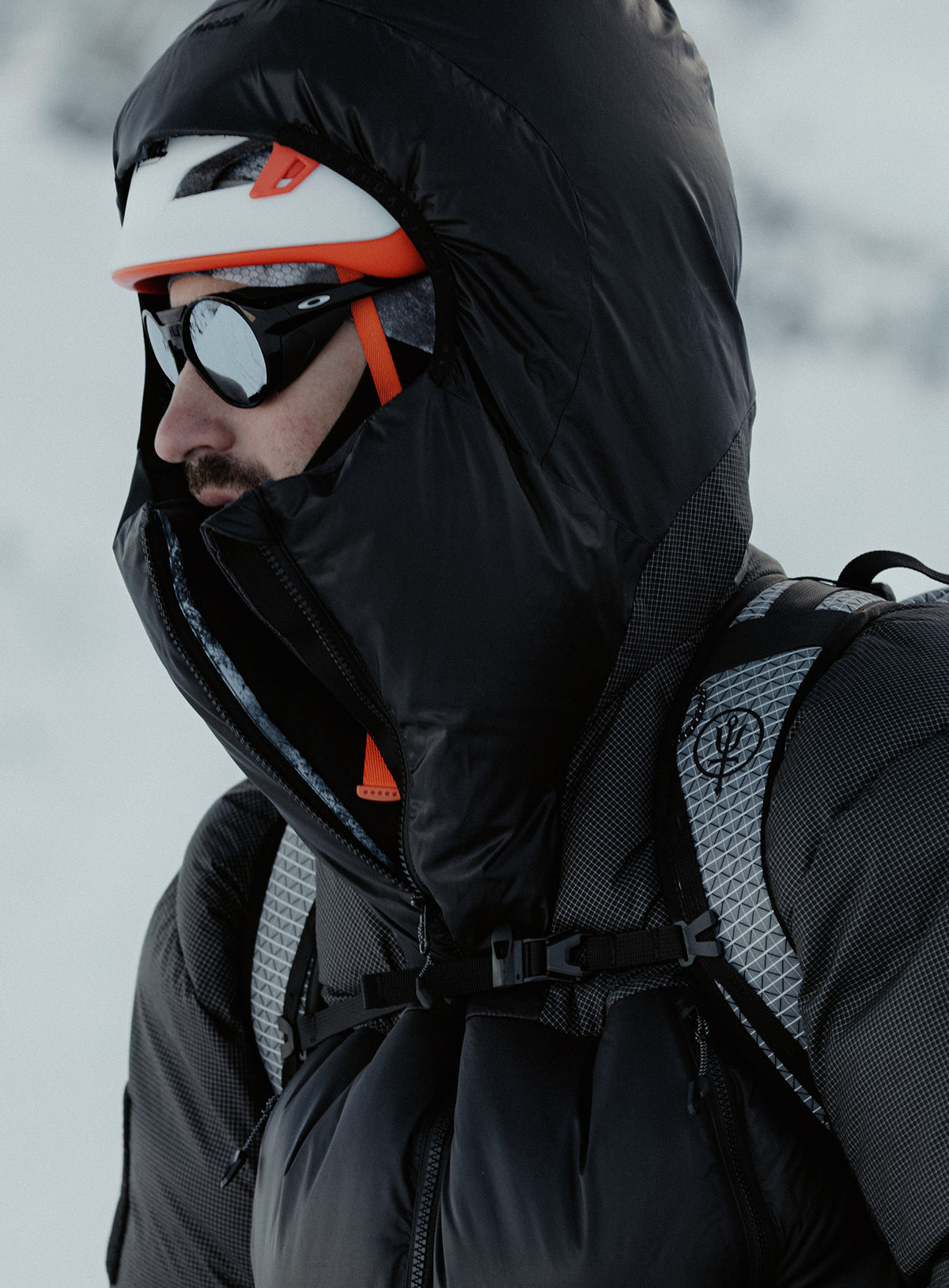 An in the field image of Breach Jacket in Obsidian Black (ITF)