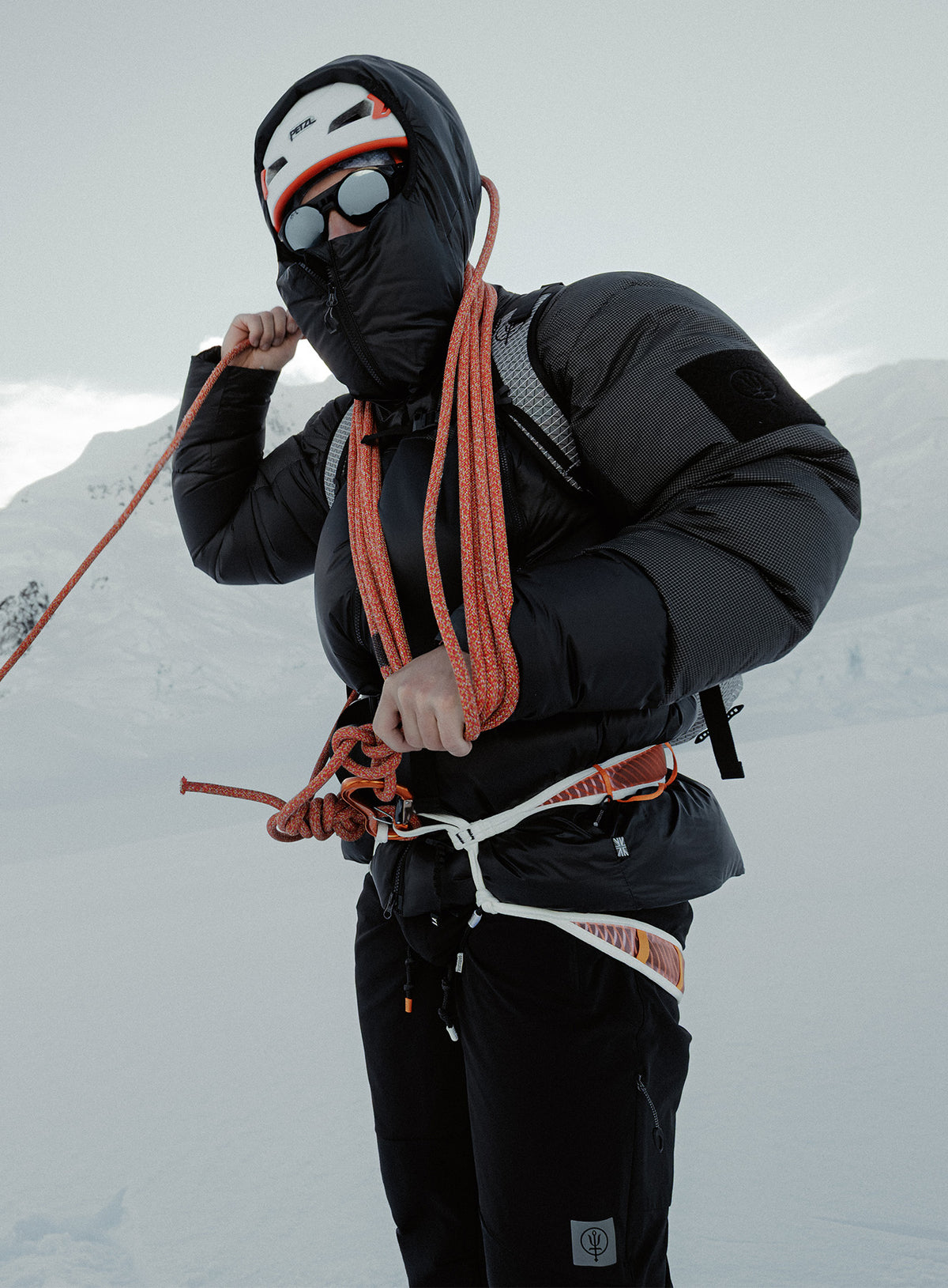 An in the field image of Breach Jacket in Obsidian Black (ITF)