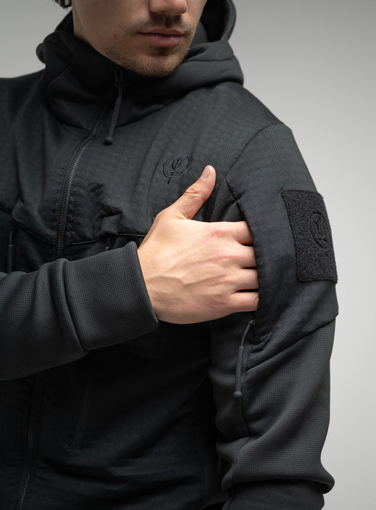 Zipped Arm Pockets