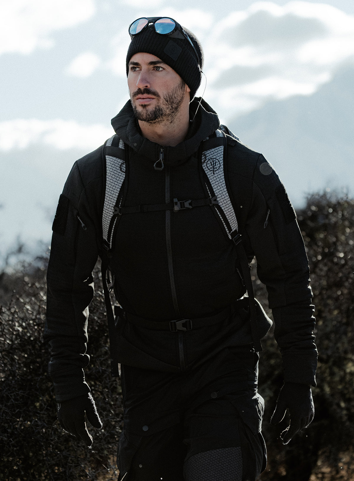 An in the field image of Centurion Jacket in Obsidian Black (ITF)