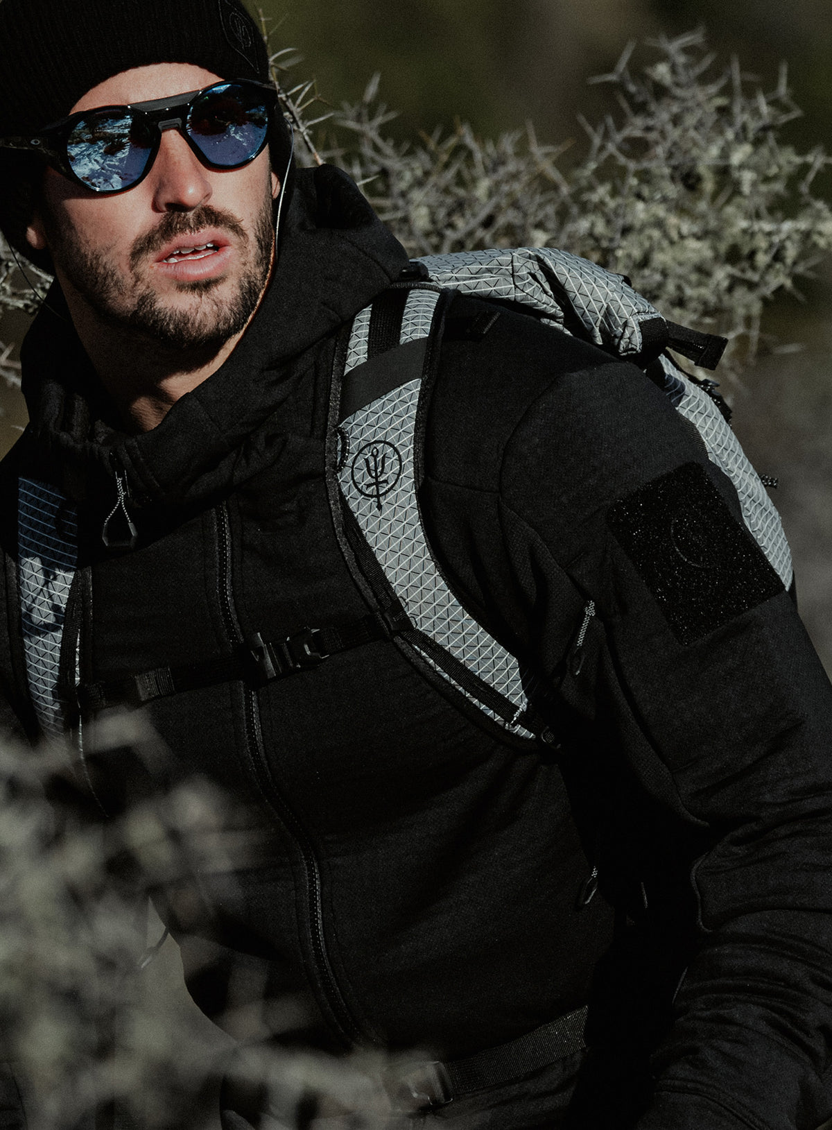 An in the field image of Centurion Jacket in Obsidian Black (ITF)