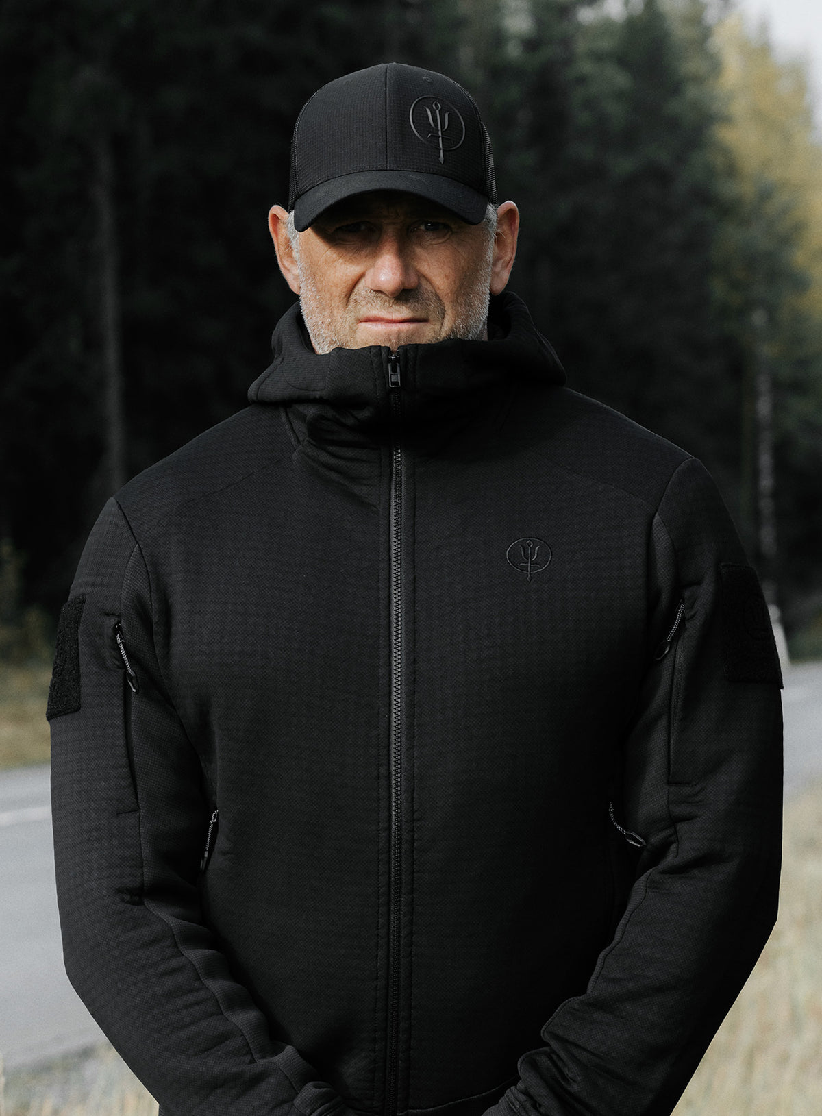 An in the field image of Centurion Jacket in Obsidian Black (ITF)