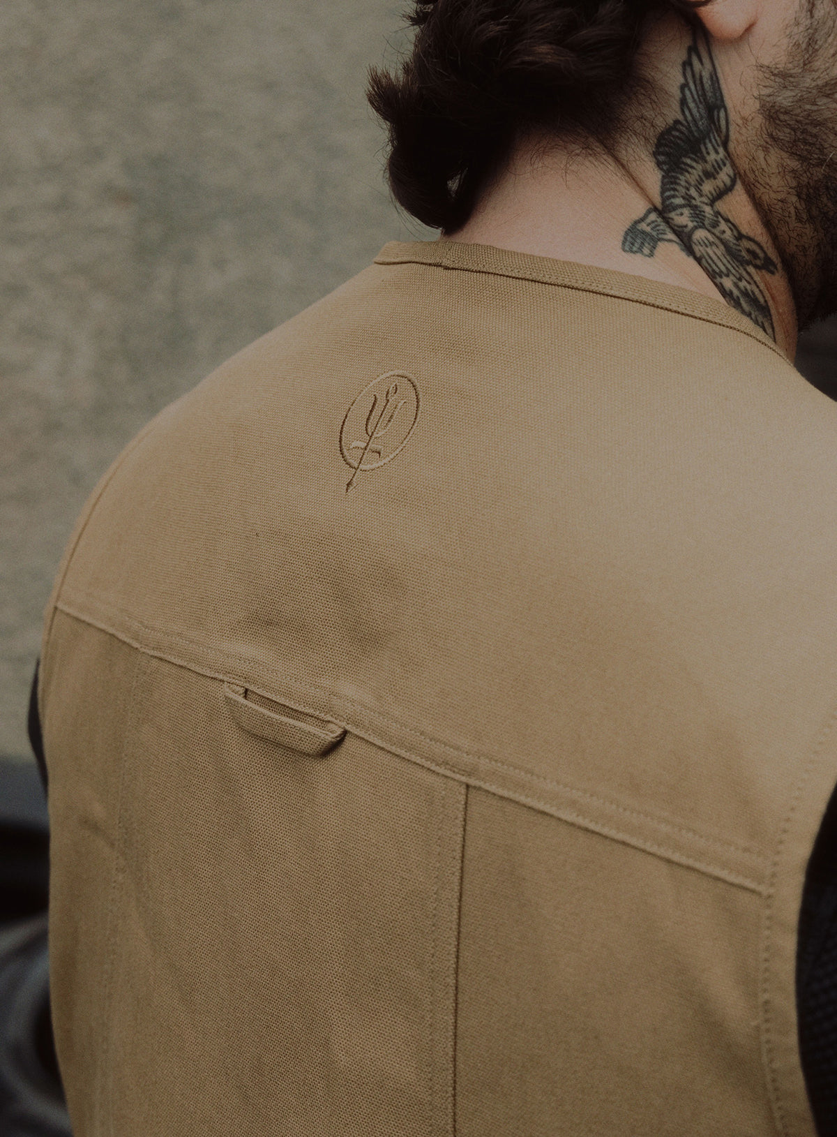 An in the field image of Men's Dissident Utility Vest in Coyote Brown (ITF)