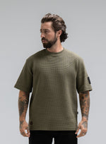 A studio shot of Men's Dissident Waffle T-Shirt in Khaki (SS)