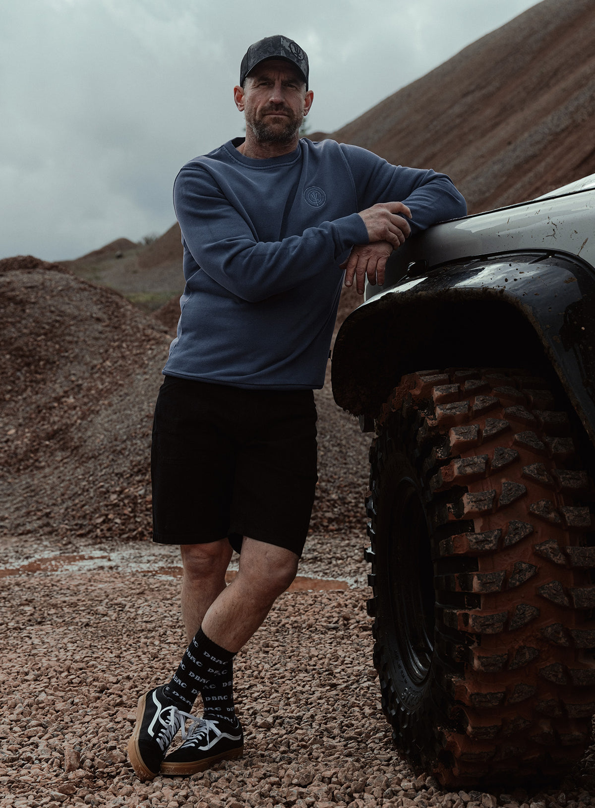An in the field image of Dissident Washed Jumper in Navy (ITF)