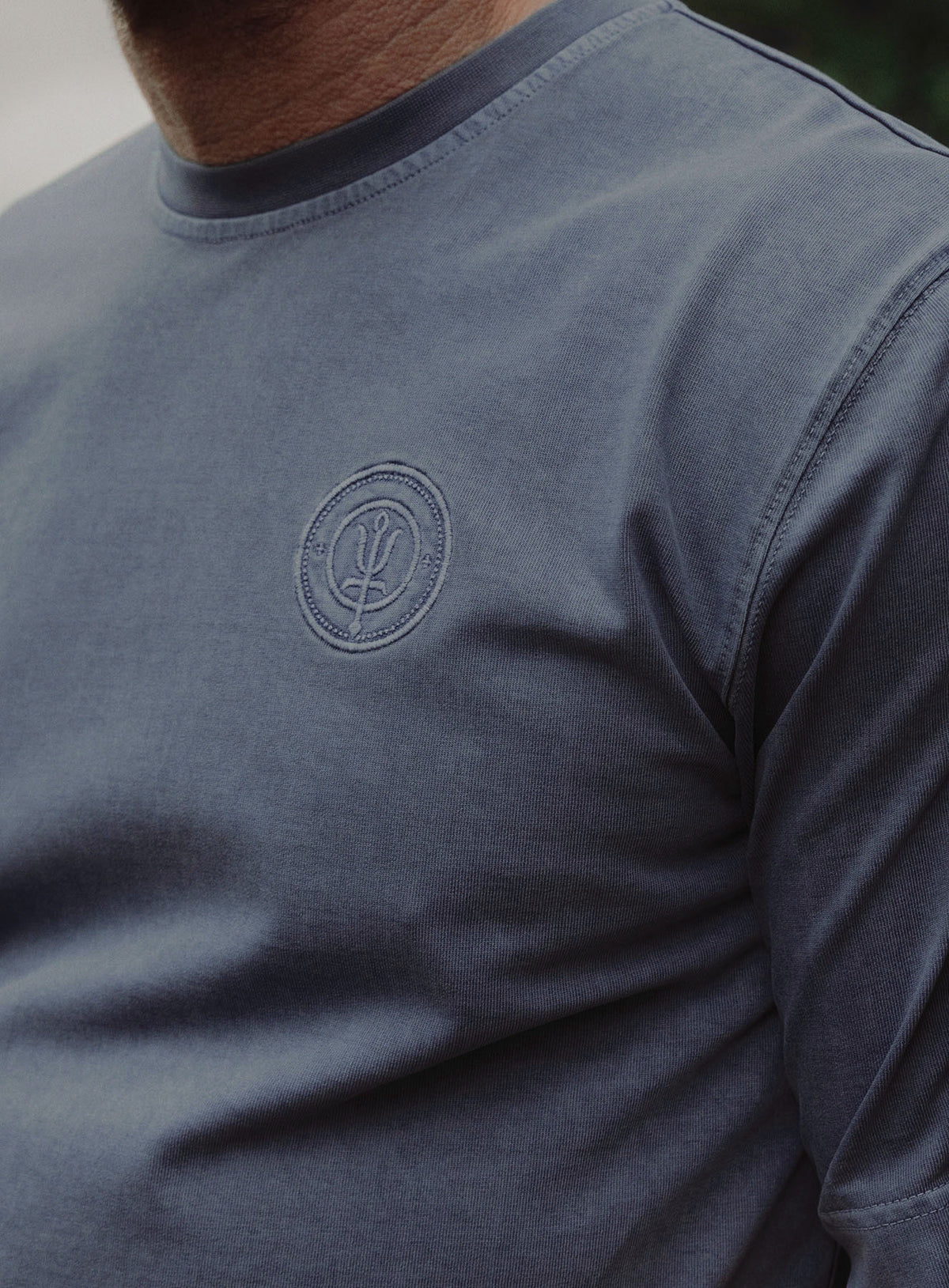 An in the field image of Dissident Washed T-Shirt in Navy (ITF)