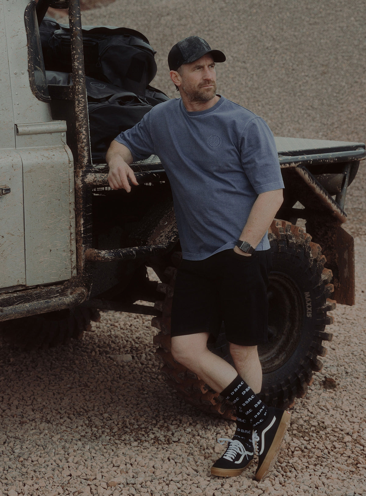 An in the field image of Dissident Washed T-Shirt in Navy (ITF)