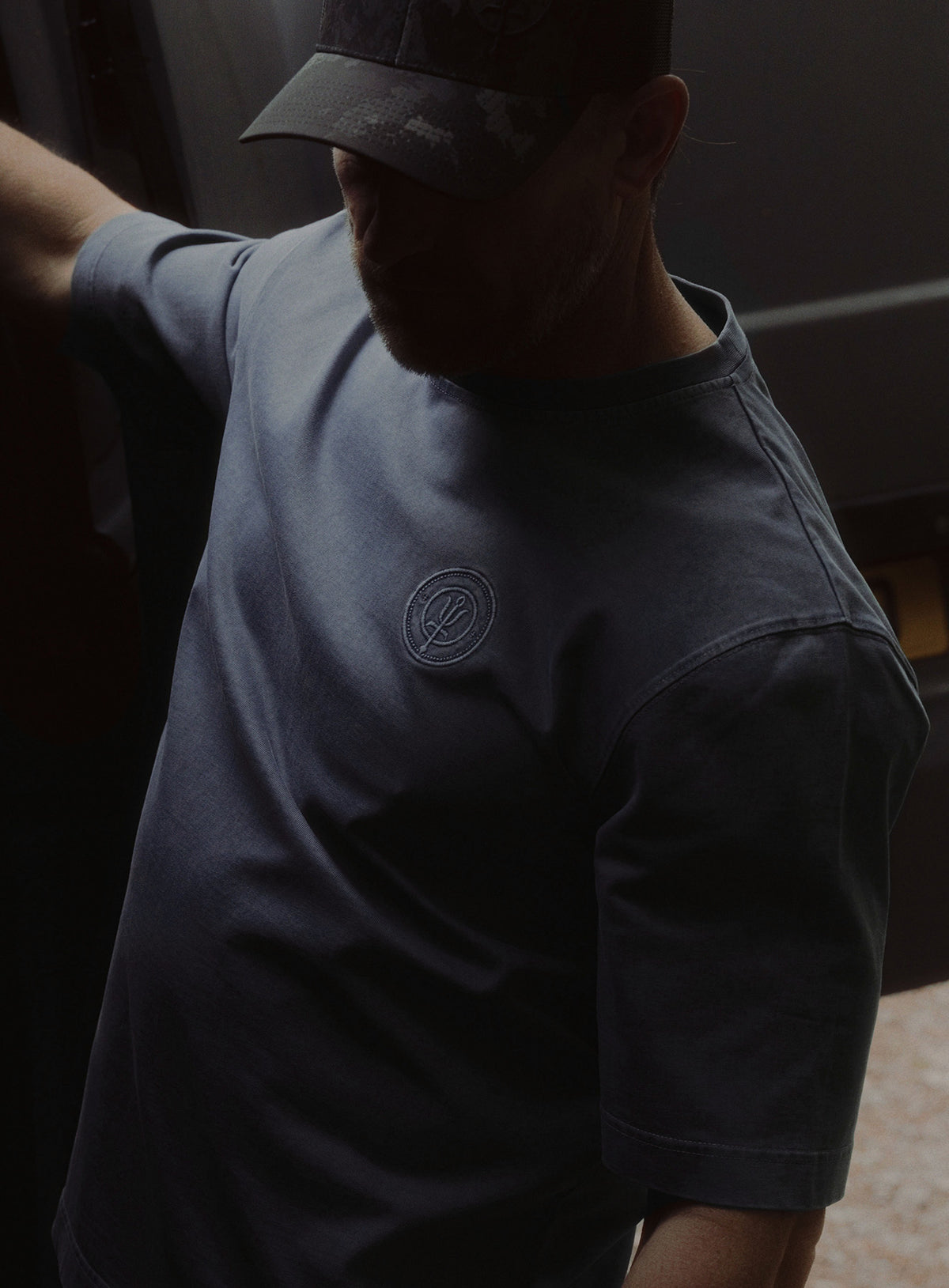 An in the field image of Dissident Washed T-Shirt in Navy (ITF)