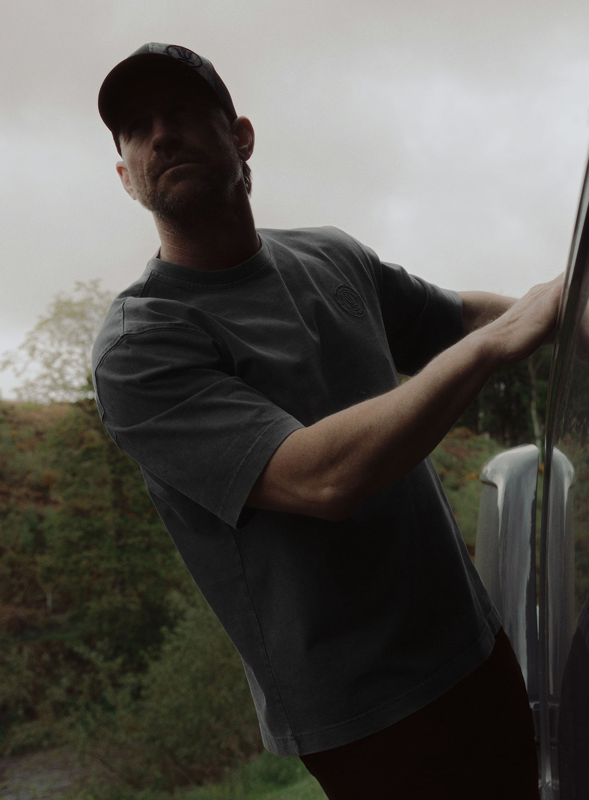 An in the field image of Dissident Washed T-Shirt in Obsidian Black (ITF)