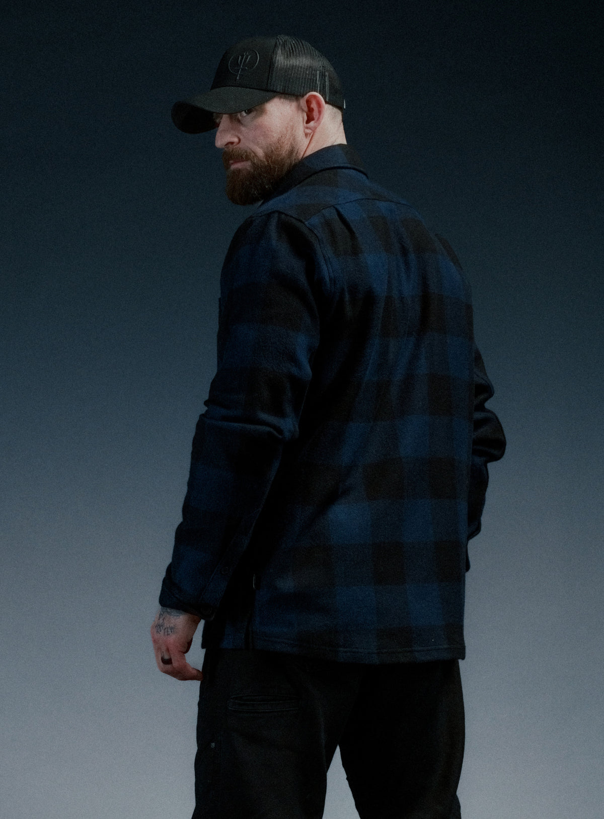 A creative studio shot of Flannel Shirt - Check in Dark Sapphire (CS)