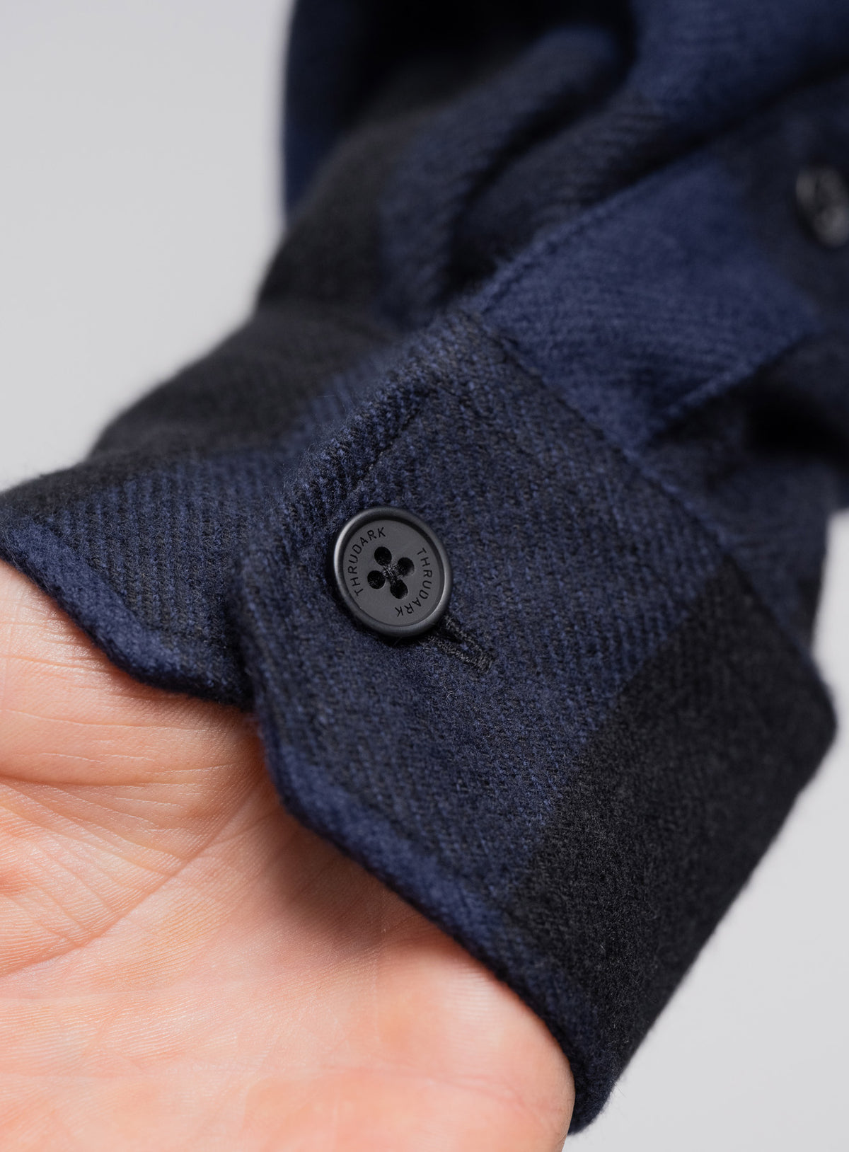 Buttoned barrel cuffs