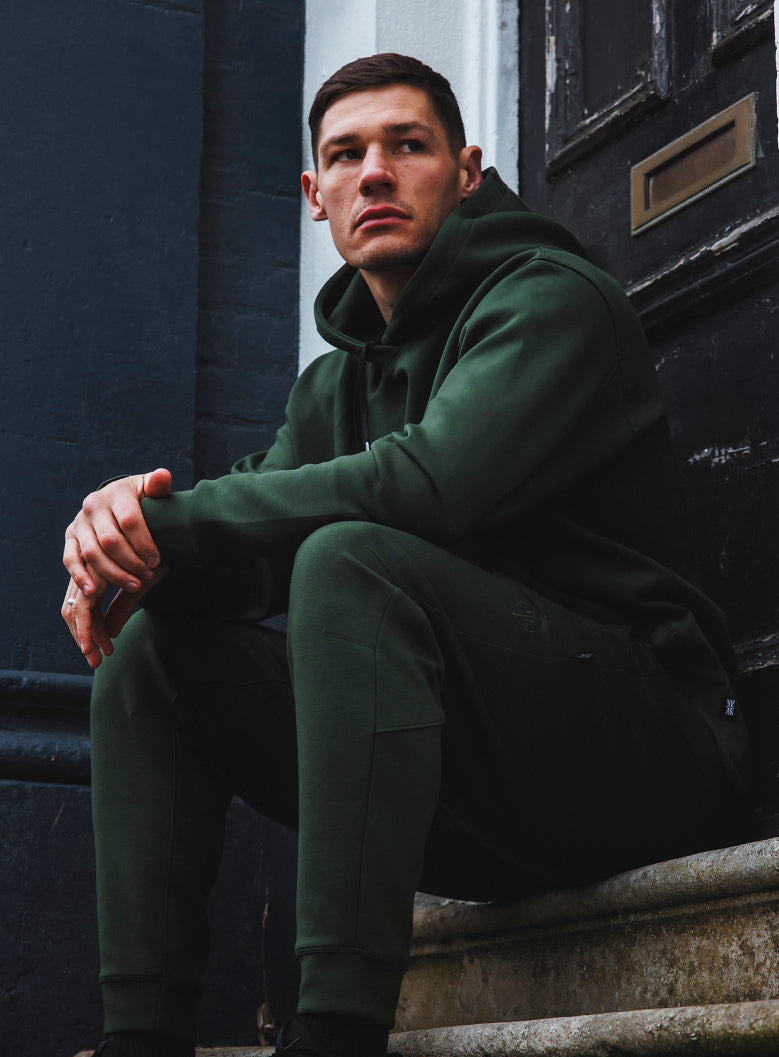 A studio shot of Force Catalyst Hoodie in Forest Green (SS)