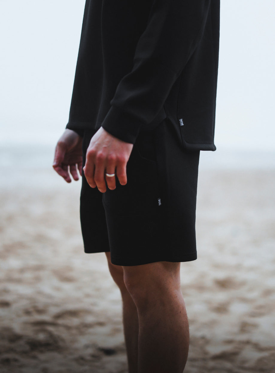 An in the field image of Force Catalyst Shorts in Obsidian Black (ITF)