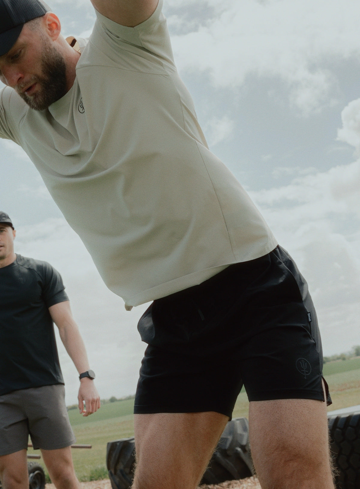 An in the field image of Force Motion Shorts in Obsidian Black (ITF)