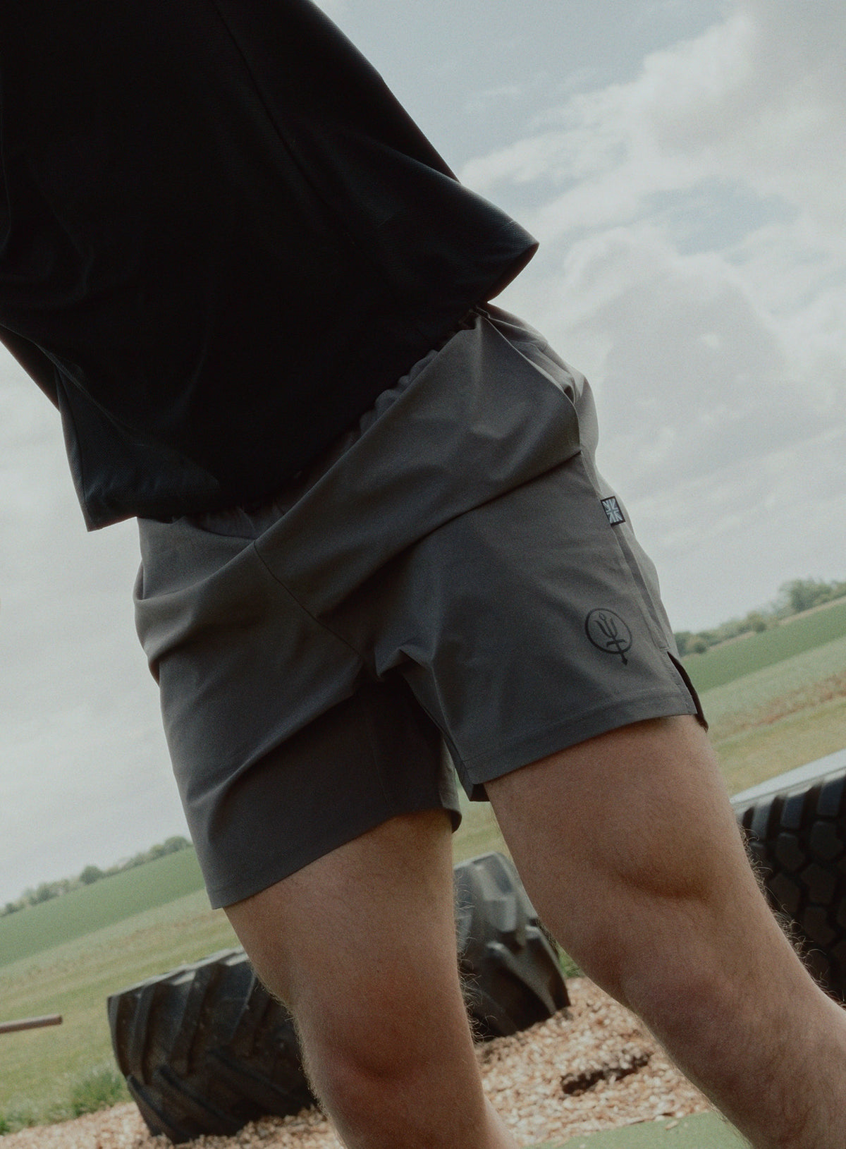 An in the field image of Force Motion Shorts in Raven Grey (ITF)
