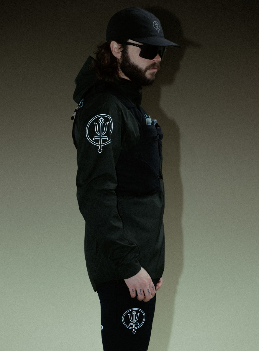 A creative studio shot of Force Trail Running Jacket in Obsidian Black (CS)
