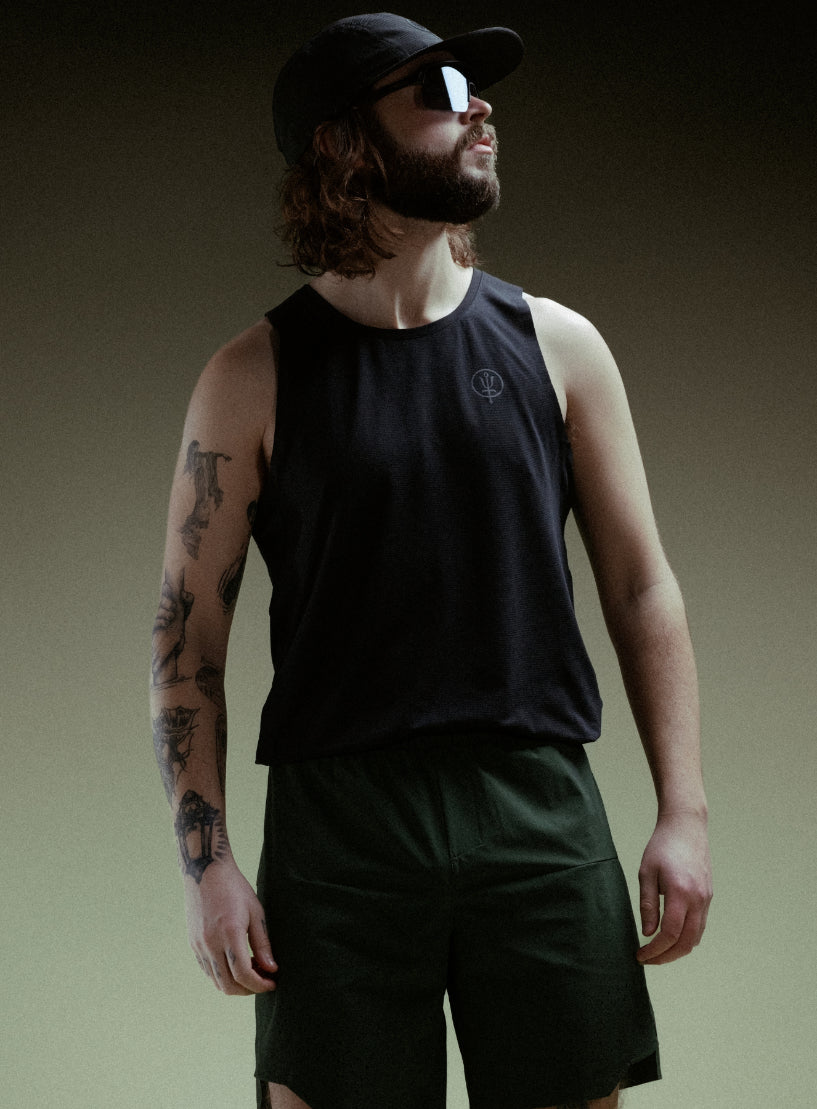 A creative studio shot of Force Trail Running 7" Shorts in Forest Green (CS)