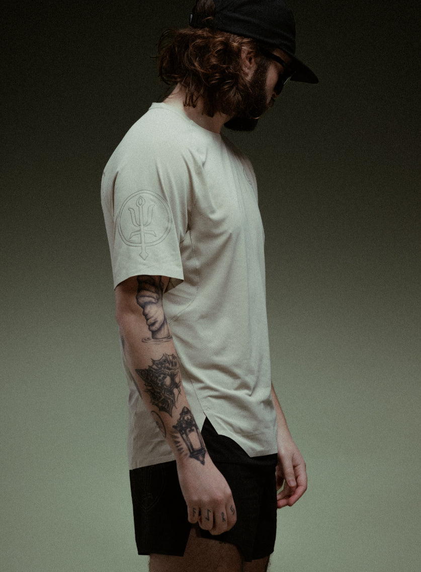 A creative studio shot of Force Trail Running T-Shirt in Stone (CS)