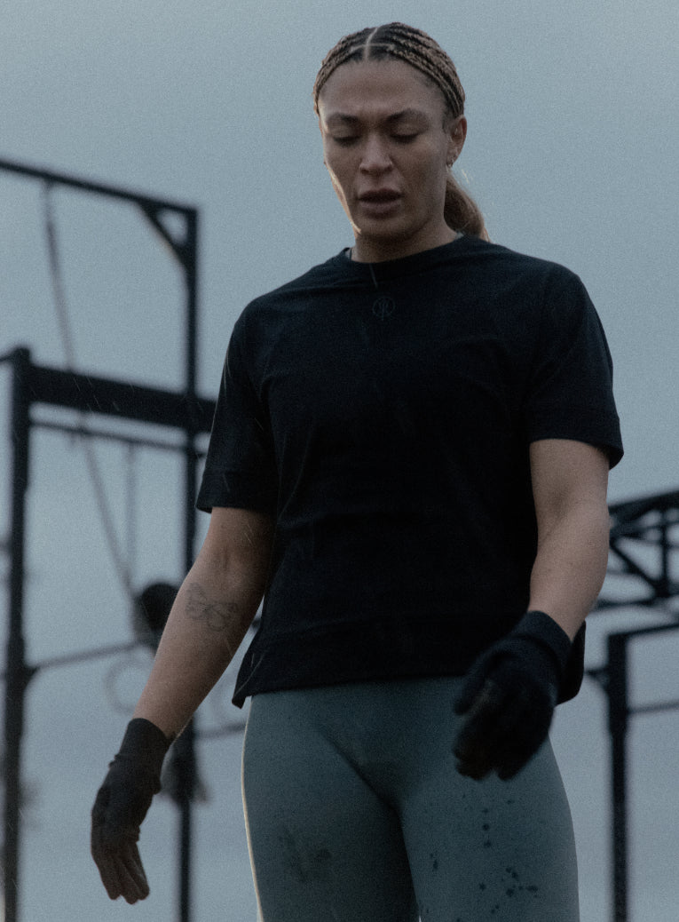 An in the field image of Women's Force Boxy DriRelease T-Shirt in Obsidian Black (ITF)