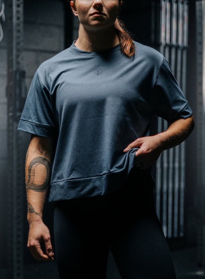 An in the field image of Women's Force Boxy DriRelease T-Shirt in Ombre Blue (ITF)